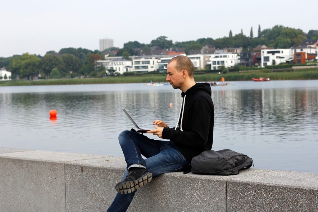 man working remotely outside